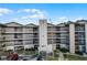 Exterior view of a multi-story building with parking at 1052 Lotus Cove Ct # 743, Altamonte Springs, FL 32714