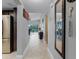 Bright and spacious entryway with tile flooring and a view into the living area at 1052 Lotus Cove Ct # 743, Altamonte Springs, FL 32714