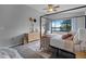 Bedroom with lake view, four-poster bed, and dresser at 1052 Lotus Cove Ct # 743, Altamonte Springs, FL 32714