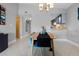 Charming dining area with a view into the kitchen and hallway at 1052 Lotus Cove Ct # 743, Altamonte Springs, FL 32714