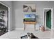 Living area showcasing a stylish TV console and access to a private balcony at 1052 Lotus Cove Ct # 743, Altamonte Springs, FL 32714