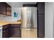 Modern kitchen features stainless steel appliances and dark cabinetry at 1052 Lotus Cove Ct # 743, Altamonte Springs, FL 32714