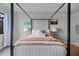 Main bedroom with a four-poster bed and calming decor at 1052 Lotus Cove Ct # 743, Altamonte Springs, FL 32714