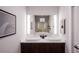 Elegant bathroom with double sinks and a large vanity at 209 N Pine Ave, Oviedo, FL 32765
