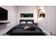 Cozy bedroom featuring a comfortable bed and stylish decor at 209 N Pine Ave, Oviedo, FL 32765
