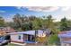 Front view of a single-story house with a screened porch and landscaped yard at 3206 Sherry Dr, Orlando, FL 32810