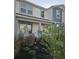 Two-story home with gray and white exterior at 14315 Sapelo Beach Dr, Orlando, FL 32827