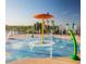 Community splash pad with colorful water features at 14315 Sapelo Beach Dr, Orlando, FL 32827