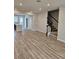 Spacious living room with hardwood floors and an open concept layout at 14315 Sapelo Beach Dr, Orlando, FL 32827