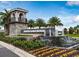 Impressive entrance to Isles of Lake Nona with fountain and signage at 14315 Sapelo Beach Dr, Orlando, FL 32827