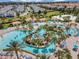 Relax and enjoy this large community pool with a waterslide at 1638 Moon Valley Dr, Davenport, FL 33896