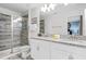 Bathroom with double vanity and walk-in shower at 1638 Moon Valley Dr, Davenport, FL 33896