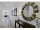 Bright entryway with tile flooring and a large mirror at 1638 Moon Valley Dr, Davenport, FL 33896