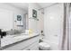 Bathroom with tub, shower, and granite countertop at 1638 Moon Valley Dr, Davenport, FL 33896