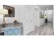 Bright and airy entryway with tile flooring and a granite-topped desk at 1638 Moon Valley Dr, Davenport, FL 33896