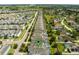 Aerial view showcasing a single house in a large community at 1638 Moon Valley Dr, Davenport, FL 33896