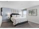 Spacious bedroom with large windows and neutral decor at 1638 Moon Valley Dr, Davenport, FL 33896