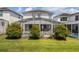 Home with private pool, screened enclosure, and lush landscaping at 1638 Moon Valley Dr, Davenport, FL 33896
