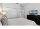 Bedroom with double bed, dresser, and large closet at 1638 Moon Valley Dr, Davenport, FL 33896