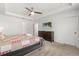 Bright main bedroom featuring a king-size bed and ample closet space at 2163 Copper Bell Pl, Kissimmee, FL 34747