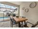 Enjoy outdoor dining and pool views from this covered patio at 2163 Copper Bell Pl, Kissimmee, FL 34747