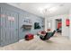 Fun game room with two gaming chairs and large TV at 2163 Copper Bell Pl, Kissimmee, FL 34747