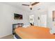 Basketball themed bedroom with a king bed, TV, and access to a game room at 2163 Copper Bell Pl, Kissimmee, FL 34747