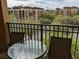 View from a condo balcony overlooking a community with trees and buildings at 12527 Floridays Resort Dr # 510E, Orlando, FL 32821