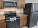 Updated kitchen with granite countertops and stainless steel appliances at 12527 Floridays Resort Dr # 510E, Orlando, FL 32821