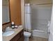 Bathroom with tub shower combination, toilet, and vanity at 12527 Floridays Resort Dr # 510E, Orlando, FL 32821