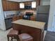 Modern kitchen with granite countertops and stainless steel appliances at 12527 Floridays Resort Dr # 510E, Orlando, FL 32821
