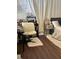 Bedroom with a bed, desk, chair, and flooring at 3635 Daydream Pl, Saint Cloud, FL 34772