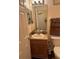 Small bathroom with single sink vanity, toilet and shower at 3635 Daydream Pl, Saint Cloud, FL 34772