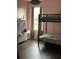 Bedroom with bunk beds and neutral colored walls at 3635 Daydream Pl, Saint Cloud, FL 34772