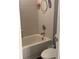 Clean bathroom with a bathtub, toilet and sink at 3635 Daydream Pl, Saint Cloud, FL 34772