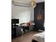 Bedroom with a desk, media setup and guitar at 3635 Daydream Pl, Saint Cloud, FL 34772