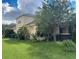 House exterior showing side yard and landscaping at 3635 Daydream Pl, Saint Cloud, FL 34772