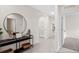 Spacious entryway with tile floors, console table, and mirror at 4093 Giorgio Dr, Winter Haven, FL 33884
