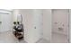 Open entryway with tile floors and access to laundry room at 4093 Giorgio Dr, Winter Haven, FL 33884