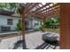 Covered patio with pergola, outdoor seating, and view of house at 5525 Barma St, Orlando, FL 32807