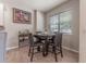 Charming dining area with round table and four chairs near window at 5525 Barma St, Orlando, FL 32807