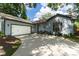 Newly renovated light blue house with a two car garage at 5525 Barma St, Orlando, FL 32807