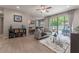 Spacious living room with hardwood floors and access to a patio at 5525 Barma St, Orlando, FL 32807