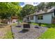 Backyard with pergola, fire pit and patio area at 5525 Barma St, Orlando, FL 32807