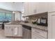 Modern kitchen with stainless steel appliances and granite countertops at 5525 Barma St, Orlando, FL 32807