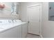 Laundry room with side-by-side washer and dryer at 5525 Barma St, Orlando, FL 32807