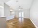 Bright living room featuring tile floors and french doors at 15901 Greater Groves Blvd, Clermont, FL 34714