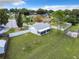 Aerial view of house, yard, and surrounding neighborhood at 15901 Greater Groves Blvd, Clermont, FL 34714