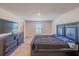 Large main bedroom with a dresser and a comfortable bed at 1714 Wynford Cir, Tavares, FL 32778