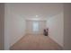 Bright bedroom with carpeted floor and window at 1714 Wynford Cir, Tavares, FL 32778